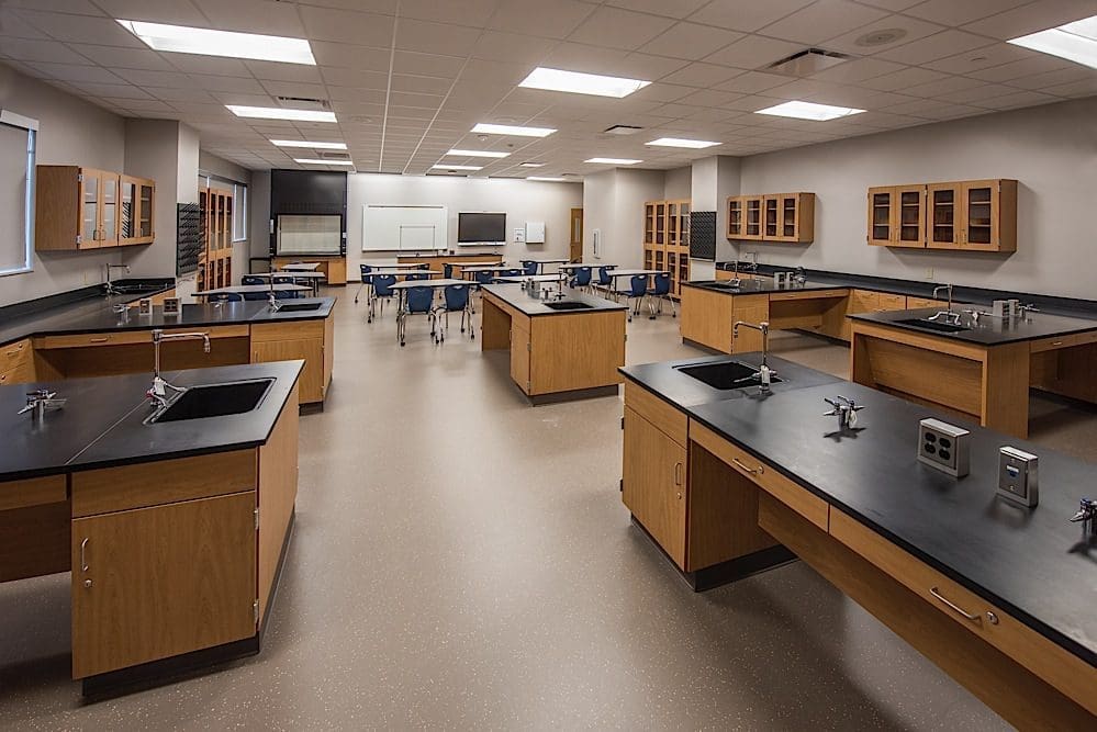 Modern science classroom with lab workstations.