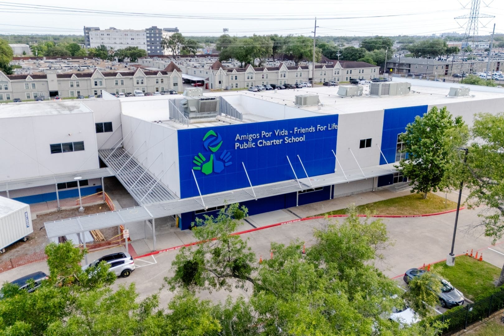 Modern public charter school building exterior view.