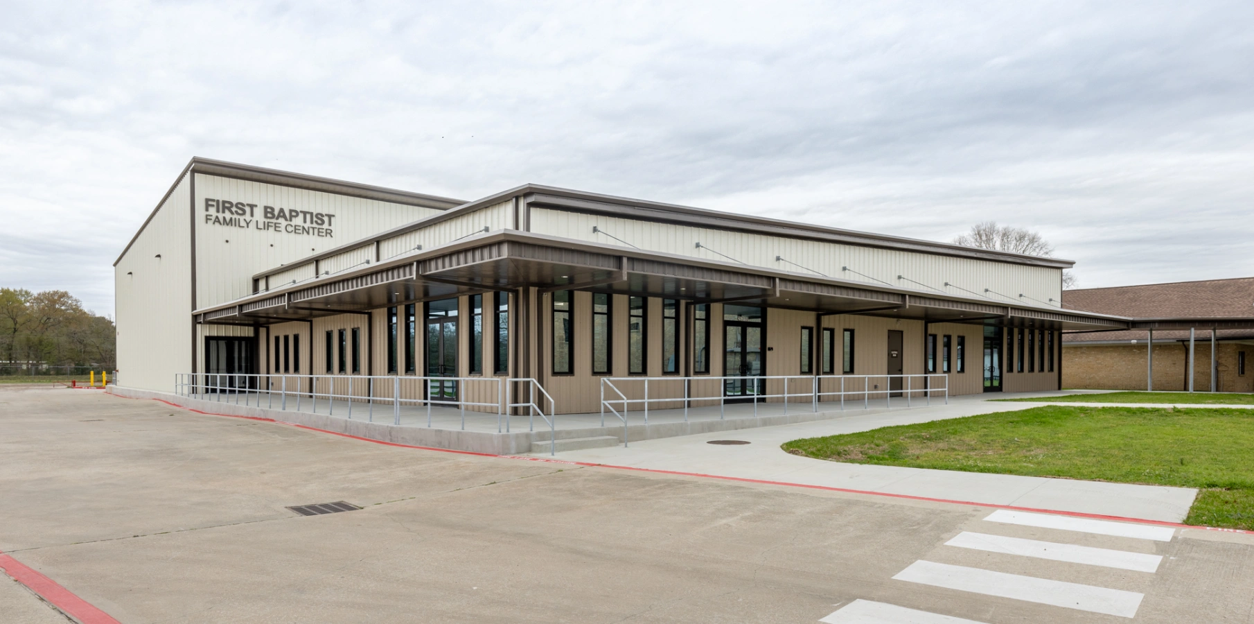 Modern church family life center building exterior.