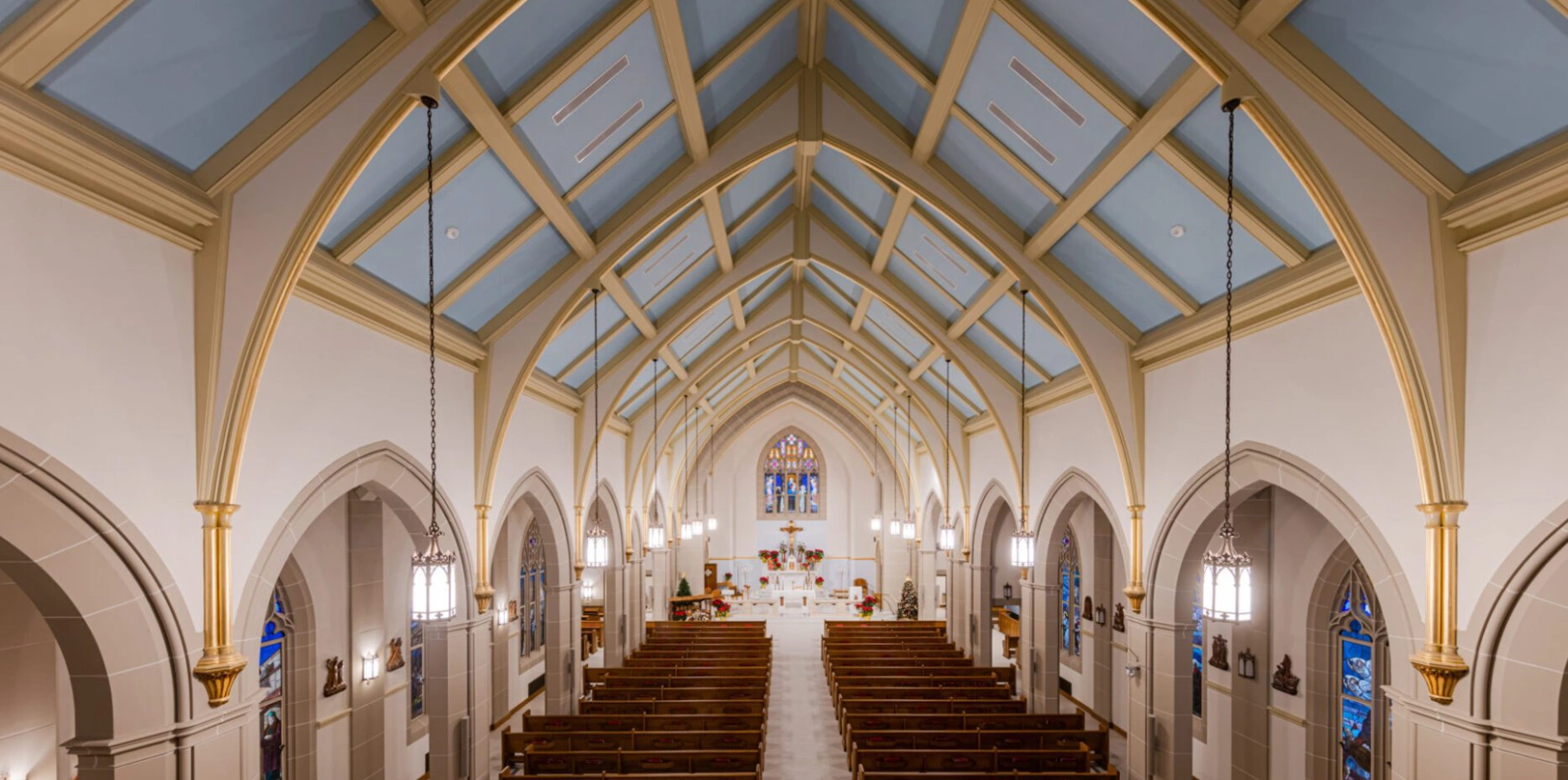 Interior of a church with vaulted ceiling.