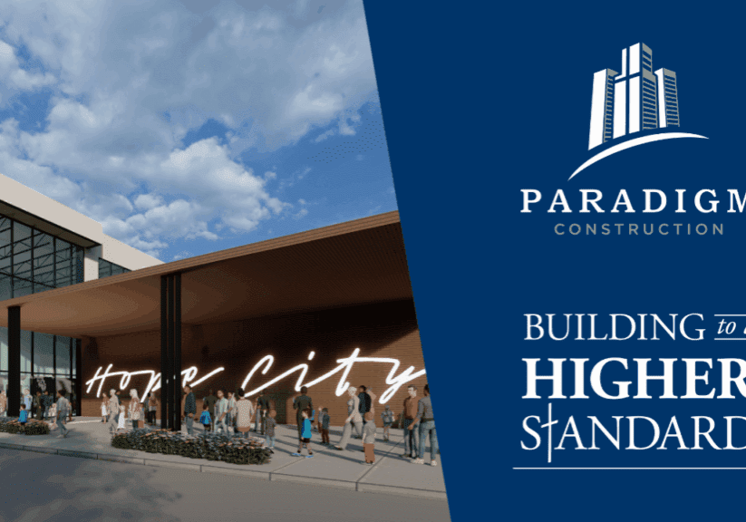 Modern building with Paradigm Construction logo.